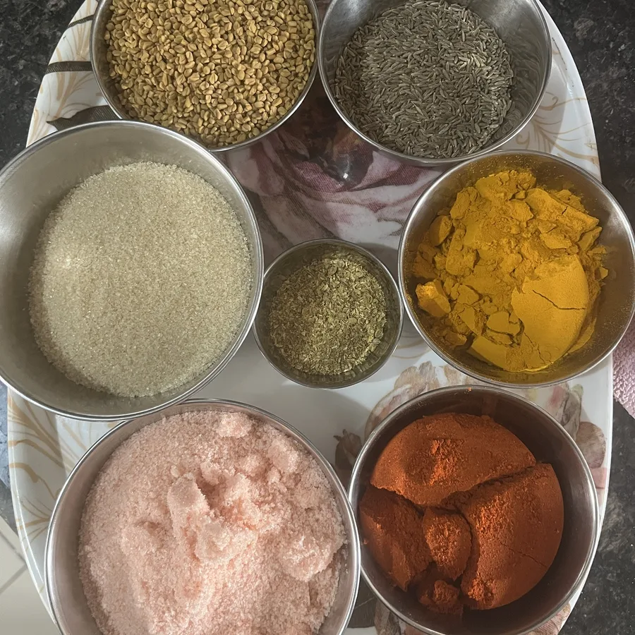 Buknu ingredients in steel katoris on a thali